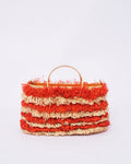 Woven handbag with red and beige layers on a white background