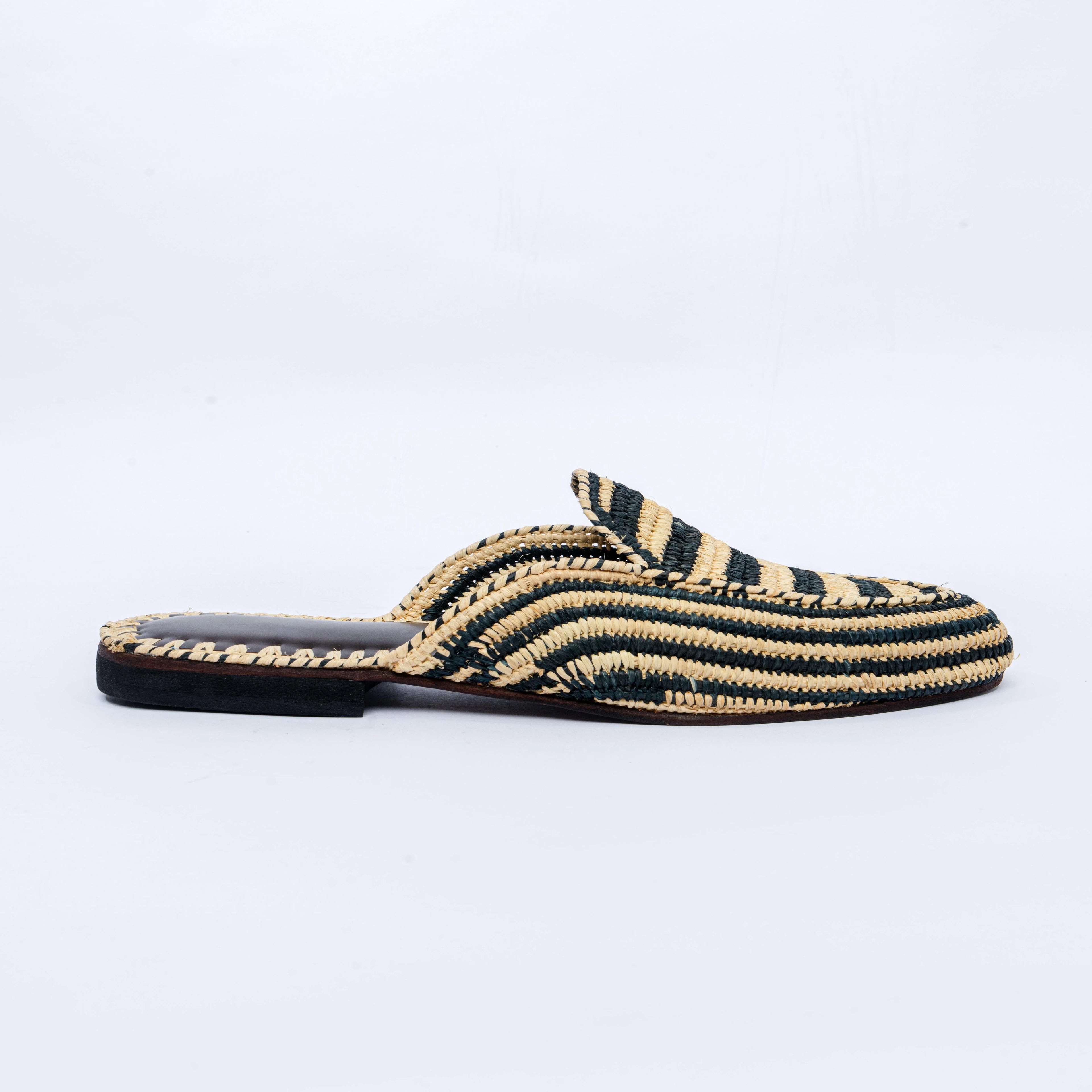Striped sandal with black and beige pattern on a white background